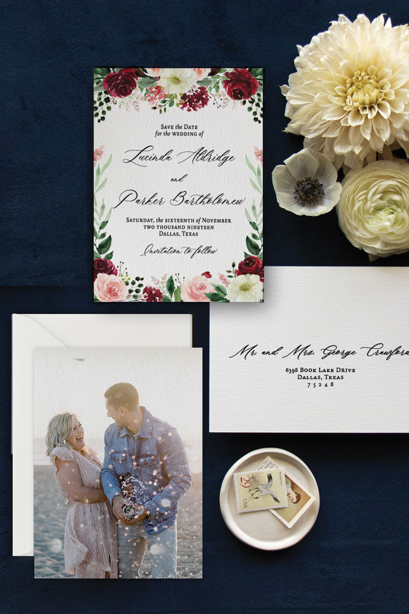 Watercolor save the date with burgundy, blush, and white flowers and elegant calligraphy script font and engagement photo.